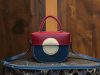 Mini saddle handbag in vegetable-tanned calfskin