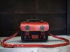 handcrafted messenger satchel with vintage silhouette in vege tan calfskin