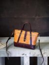 Structured shopper tote in veg tan calfskin