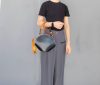Handcrafted geometric origami-inspired handbag in italian veg-tan calfskin