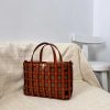 minimalist handcrafted small carryall tote with canvas insert in veg tan calfskin