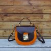 handcrafted equestrian mini crossbody saddle with antique brass handware