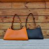 handcrafted minimalist underarm baguette in italian veg-tan cowhide
